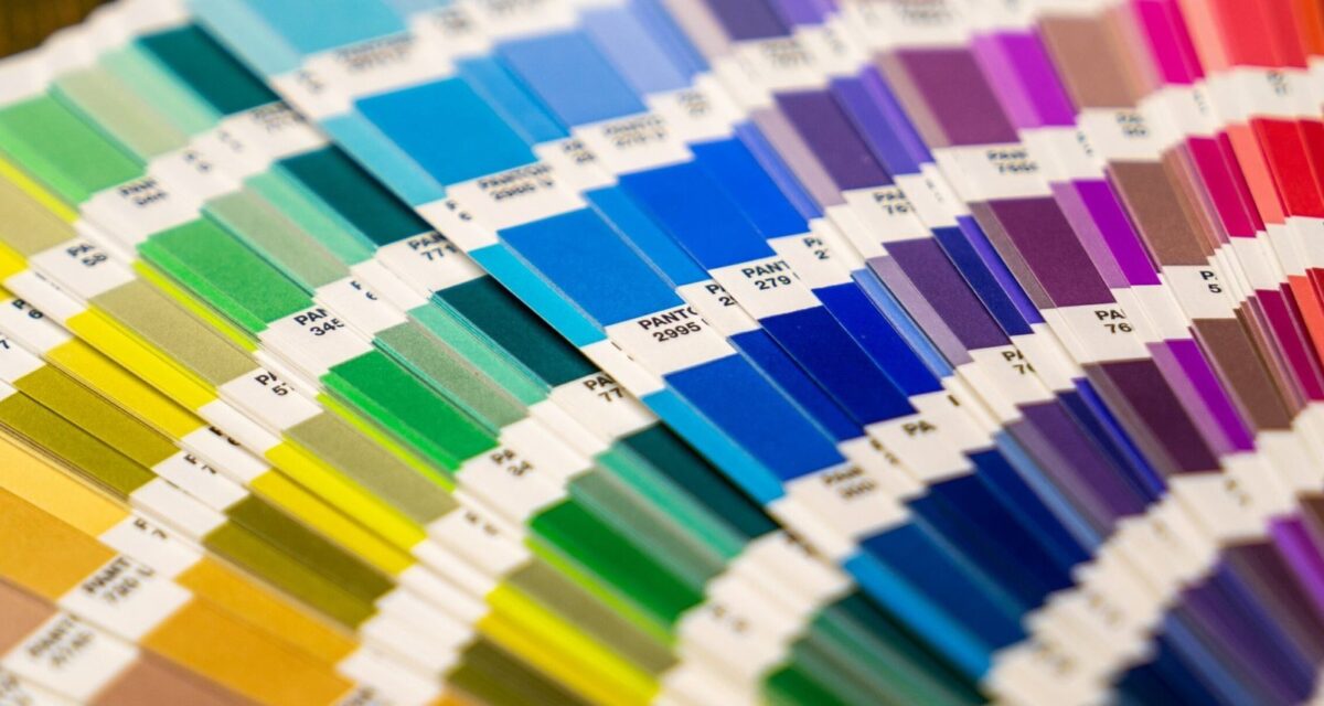 Fanned printing colour swatch books showing the full colour range