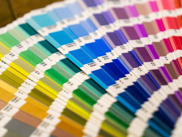 Fanned printing colour swatch books showing the full colour range