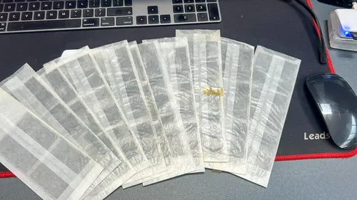 Collection of film negatives and slides ready for digitising